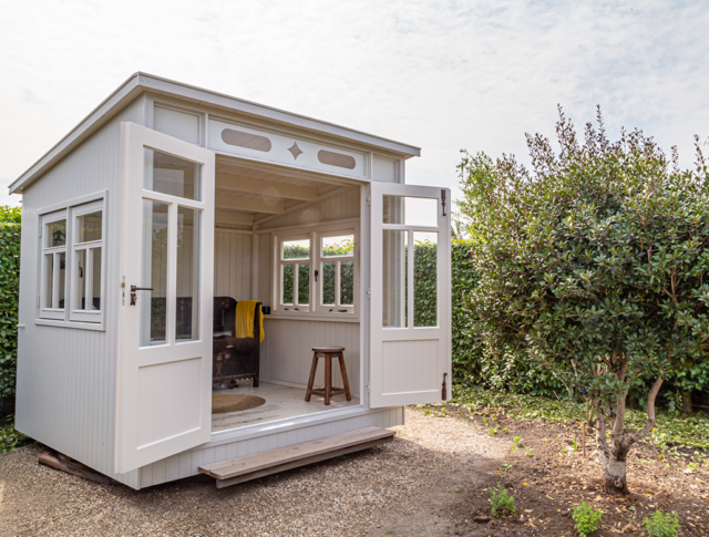 Converted shed that can be used for reading space or relaxation.